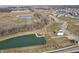 Aerial view of Cardinal Grove community, showing new homes and pond at 6623 Sulgrove Pl, Indianapolis, IN 46221