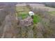 Aerial view of house, detached garage, and expansive land at 720 E 400 N, Anderson, IN 46012