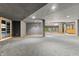 Large, open basement with gray walls and carpeted floors at 720 E 400 N, Anderson NE, IN 46012