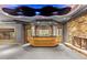 Modern wet bar with stone feature wall in a spacious basement at 720 E 400 N, Anderson, IN 46012
