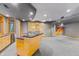 Finished basement showcasing a wet bar and stone fireplace at 720 E 400 N, Anderson, IN 46012