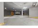 Spacious finished basement with plush carpeting, a projector screen, and recessed lighting at 720 E 400 N, Anderson, IN 46012