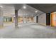 Finished basement with gray walls and carpeted floors at 720 E 400 N, Anderson, IN 46012