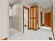 Bathroom with shower, toilet, and built-in cabinet at 720 E 400 N, Anderson, IN 46012