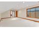 Spacious bedroom with window and carpet flooring at 720 E 400 N, Anderson, IN 46012