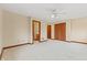 Bedroom with ceiling fan, carpet, and en suite bathroom at 720 E 400 N, Anderson, IN 46012