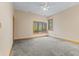 Spacious bedroom with large windows and neutral carpeting at 720 E 400 N, Anderson NE, IN 46012