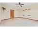 Bright bedroom with ceiling fan and access to other rooms at 720 E 400 N, Anderson, IN 46012
