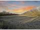 Open field at sunset with a tree line in the distance at 720 E 400 N, Anderson, IN 46012