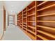 Long hallway with built-in wooden bookshelves at 720 E 400 N, Anderson, IN 46012