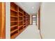 Hallway with built in bookshelves and carpet at 720 E 400 N, Anderson, IN 46012