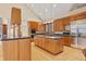 Modern kitchen with stainless steel appliances and wood cabinetry at 720 E 400 N, Anderson, IN 46012