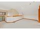 Spacious loft area with wood trim and carpeting at 720 E 400 N, Anderson, IN 46012