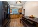 Kitchen with wooden cabinets, black appliances, and a dining area at 1605 E Thompson Rd, Indianapolis, IN 46227