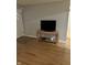 Bright entryway with hardwood floors and a view to the living room at 6804 Bonny Dr, Indianapolis, IN 46221
