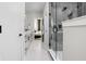 Modern bathroom with gray tile shower and double vanity at 1224 Alabama St, Indianapolis, IN 46202
