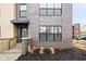 Modern brick exterior with a covered entryway and landscaping at 1224 Alabama St, Indianapolis, IN 46202