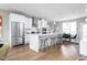 Modern kitchen with white cabinets, quartz counters, and stainless steel appliances at 1224 Alabama St, Indianapolis, IN 46202