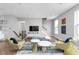 Bright and airy living room with hardwood floors and comfortable seating at 1224 Alabama St, Indianapolis, IN 46202