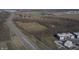 Aerial view showing property near highway and residential buildings at 2750 N County Road 1000 E, Indianapolis, IN 46234