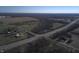 Aerial view of property near intersection and buildings at 2750 N County Road 1000 E, Indianapolis, IN 46234