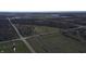 Aerial view showing property near road and go-kart track at 2750 N County Road 1000 E, Indianapolis, IN 46234