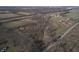 Aerial view showing property with road and nearby buildings at 2750 N County Road 1000 E, Indianapolis, IN 46234