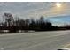 Roadside view of trees and land; sunny sky at 2750 N County Road 1000 E, Indianapolis, IN 46234