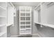 Large walk-in closet with shelving and hanging rods at 9464 Maple Way # 27, Indianapolis, IN 46268