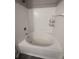 Bathroom with a large oval bathtub and white tile at 12938 University Cres # Apt 2B, Carmel, IN 46032