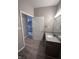 Bathroom with granite vanity and neutral flooring at 12938 University Cres # Apt 2B, Carmel, IN 46032