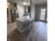 Kitchen features granite countertops and stainless steel appliances at 12938 University Cres # Apt 2B, Carmel, IN 46032