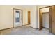 Bedroom with sliding door to deck and closet at 13832 W Old Nashville Rd, Columbus, IN 47201