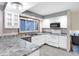 Bright kitchen with white cabinets, granite countertops, and stainless steel appliances at 13832 W Old Nashville Rd, Columbus, IN 47201