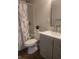 Modern bathroom, grey vanity, and tub shower at 1826 N Dexter St, Indianapolis, IN 46202