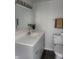 Clean bathroom with gray vanity, toilet, and towels at 1826 N Dexter St, Indianapolis, IN 46202