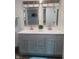 Double vanity bathroom with modern fixtures at 1826 N Dexter St, Indianapolis, IN 46202