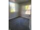 Bright bedroom with neutral walls and carpet at 1826 N Dexter St, Indianapolis, IN 46202