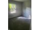 Well-lit bedroom featuring grey carpet at 1826 N Dexter St, Indianapolis, IN 46202