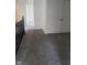 Spacious hallway with grey carpet and doors at 1826 N Dexter St, Indianapolis, IN 46202