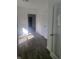 Bright hallway with hardwood floors and access to other rooms at 1826 N Dexter St, Indianapolis, IN 46202
