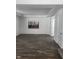 Bright living room with hardwood floors and a city skyline canvas at 1826 N Dexter St, Indianapolis, IN 46202