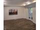 Bright living room with vinyl flooring and French doors at 1826 N Dexter St, Indianapolis, IN 46202