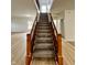 Elegant staircase leading to the upper level at 832 Spinney Ln, Whiteland, IN 46184