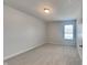 Simple bedroom with carpeted floor and a window at 9558 Oakley Dr, Indianapolis, IN 46260