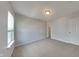 Spacious bedroom with carpeted floor and window at 9558 Oakley Dr, Indianapolis, IN 46260