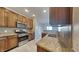 Kitchen features granite countertops and modern cabinetry at 9558 Oakley Dr, Indianapolis, IN 46260