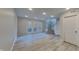 Bright living room with tile floors and access to a patio at 9558 Oakley Dr, Indianapolis, IN 46260