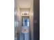 Half bath with pedestal sink and a large mirror at 10938 Delphi Dr, Camby, IN 46113