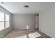 Spacious bedroom with plush carpeting, windows, and neutral-colored walls at 10938 Delphi Dr, Camby, IN 46113